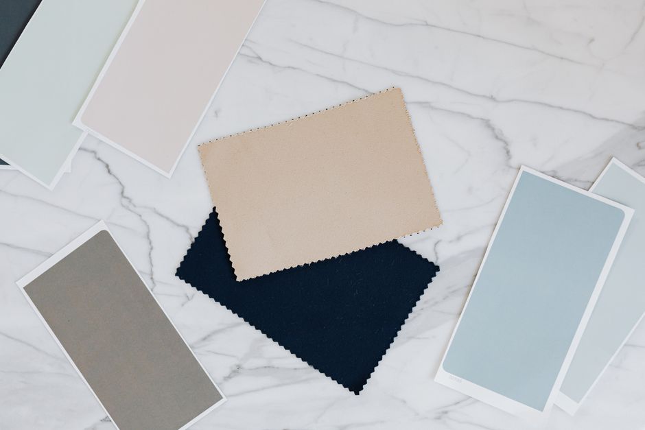 A desk and material reference image for a design board